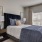 bedroom with a bed and large window