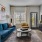 living room with a chair, couch, and coffee table