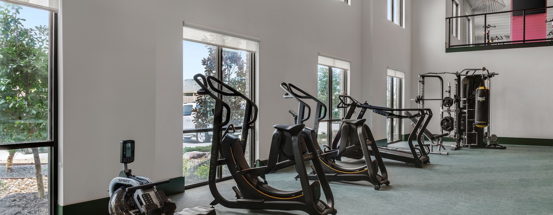 fitness center with exercise equipment