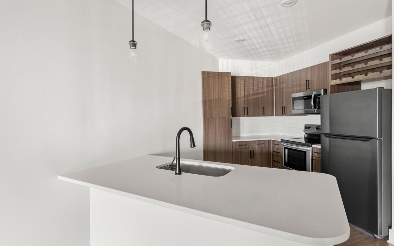 pendant lighting over kitchen serving counter